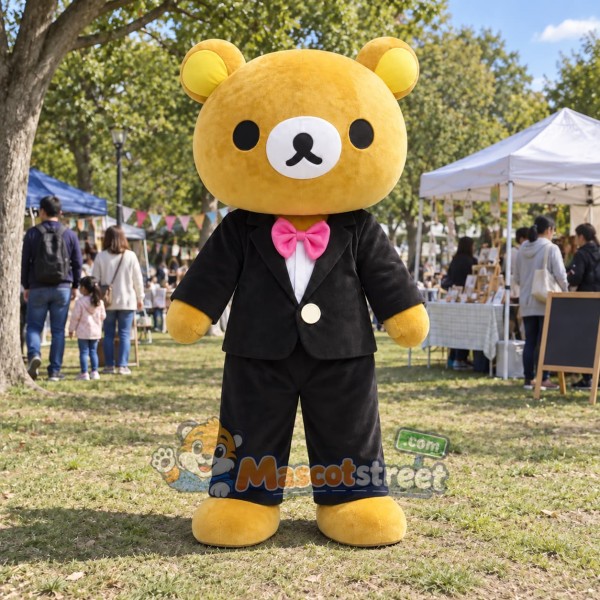 Yellow Bear Mascot Costume with Black Suit and Pink Bow Tie