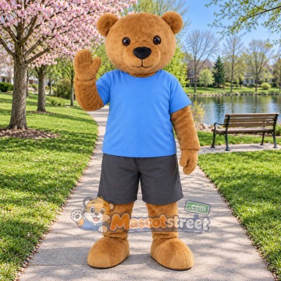 Tan Bear Mascot Costume with Blue Shirt and Gray Shorts