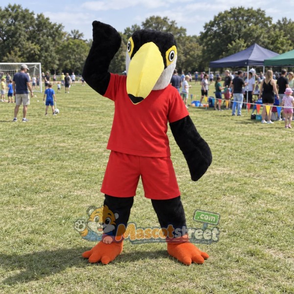 Black and White Bird Mascot Costume with Red Shirt and Shorts
