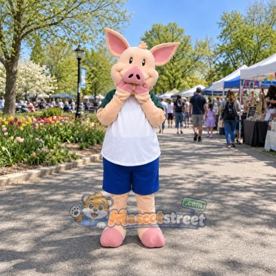 Pink Pig Mascot Costume with White and Green Shirt and Blue Shorts Pink Pig Mascot Costume with White and Green Shirt and Blue Shorts